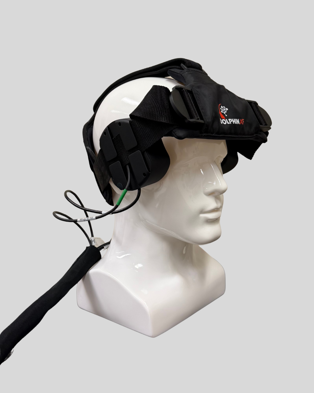 Image of a Robotic Transcranial Doppler Device connected to a model of a human head.